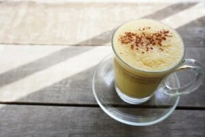 drink, beverage, cup, glass, cafe, table, wood, morning, latte, tea cup, golden milk, turmeric, hot, aroma, food, brew, tea, health